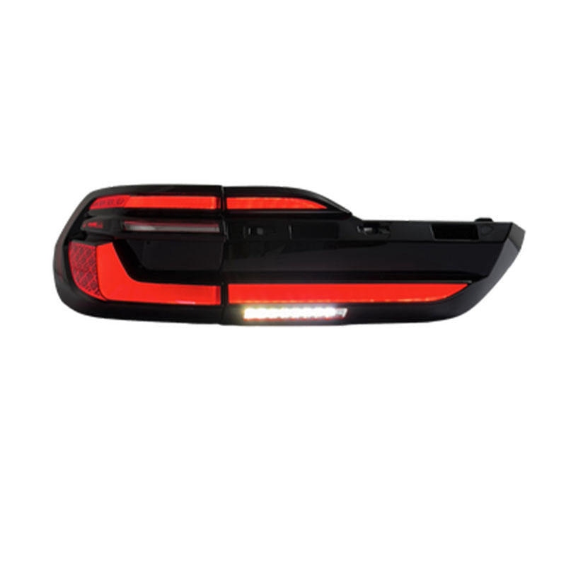 BMW X7 G07 LED tail lights assembly with dynamic turn signal by Vekto, showing sleek design and illuminated signals.