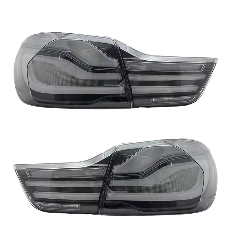 Vekto LED tail lights for BMW F32/F33/F36 4 Series 2013-2020, showing sleek red and clear lens design on a vehicle.