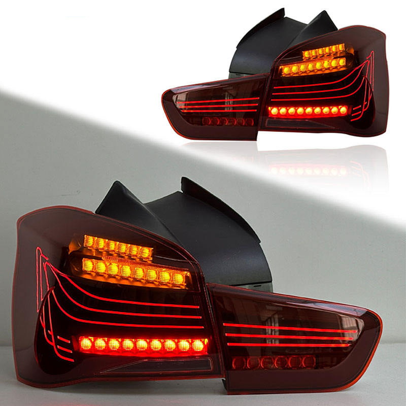 Vekto CSL Style LED tail lights for BMW 1 Series F20/F21 LCI hatchback 2015-2018, showing red and clear lens design.
