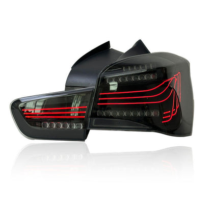 Vekto CSL style LED tail lights for BMW 1 Series F20/F21 2016-2021, showing sleek design and LED illumination.