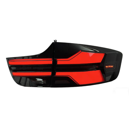 Vekto BMW X6 E71 G05 style LED taillights installed on a 2008-2014 BMW X6, showing sleek red and clear lens design.