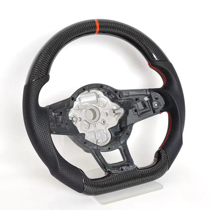 Vekto carbon fiber steering wheel for VW Golf 7 GTI R Mk7, close-up view showing textured carbon fiber finish and ergonomic grip design.