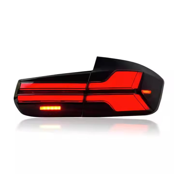 Vekto G05 Style LED tail lights installed on a BMW 3 Series F30/F35 and F80 M3, showcasing modern taillight design.