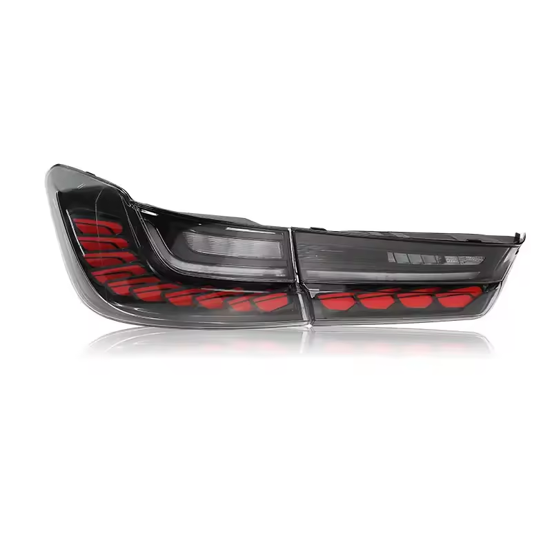 Vekto LED taillights for BMW 3 Series G20/G28 and M3 G80, 2018-2022, showing sleek tail light design with illuminated red and clear sections.
