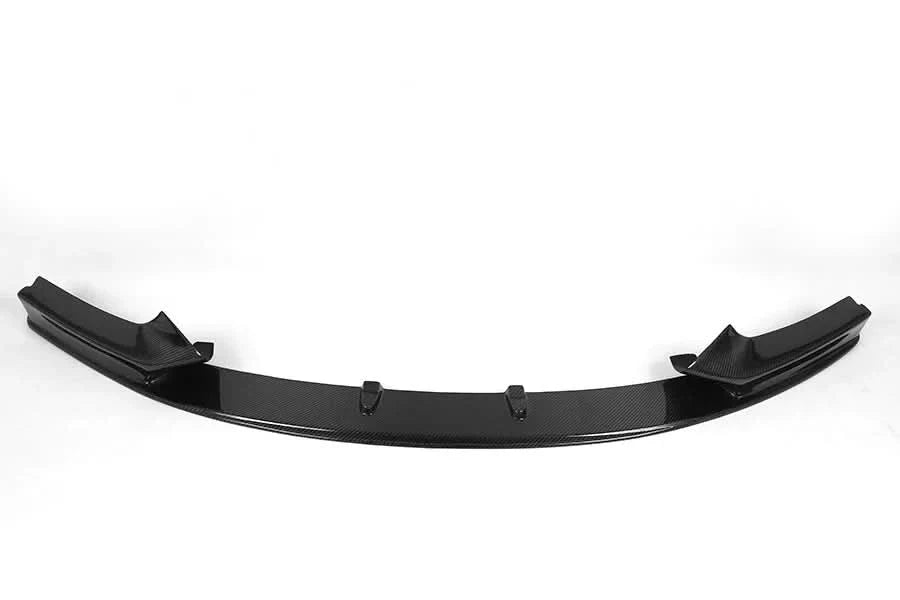 Gloss carbon fiber front lip for BMW 2 Series F22 M Sport from K2 Industries, enhances aerodynamics and sporty look.