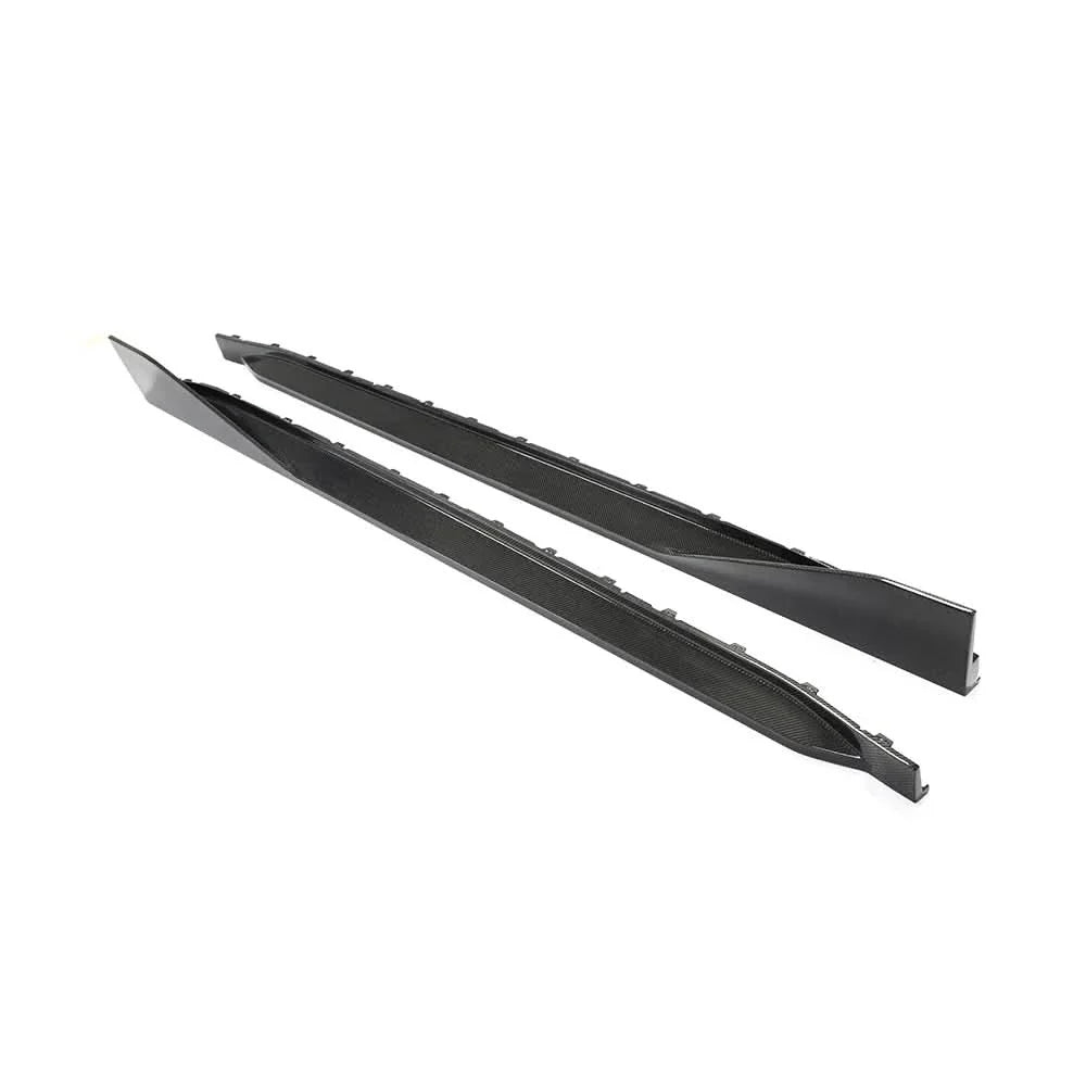 Carbon fiber side skirt extensions for BMW G82 and G83 M4 by K2 Industries, showcasing sleek, aerodynamic design on a sports car.