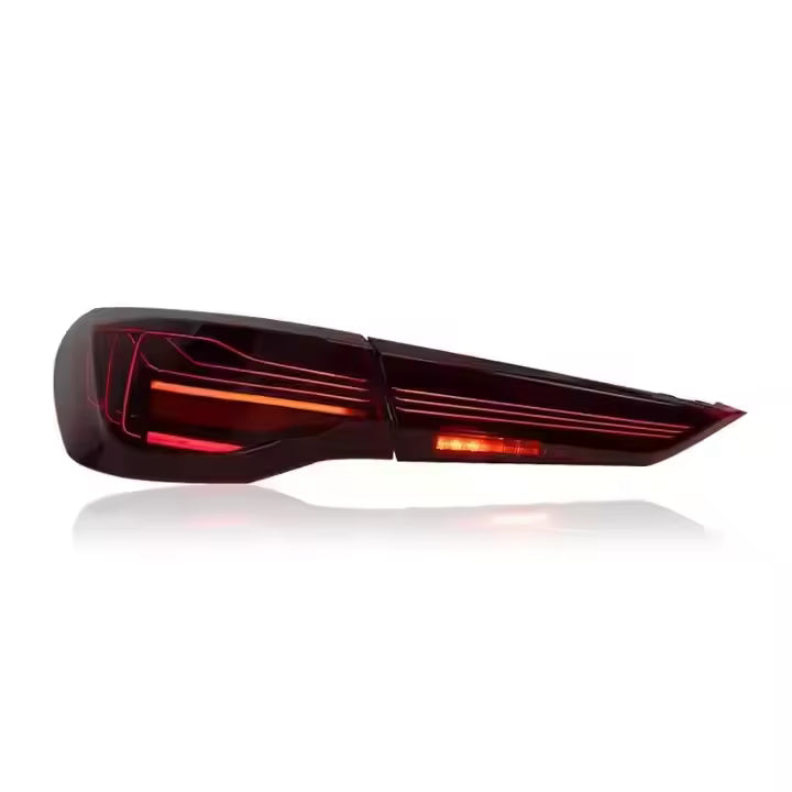 Vekto CSL Style LED tail lights for BMW 4 Series G22, G23, G26, G82 M4 2020-2022, showing sleek design and bright illumination