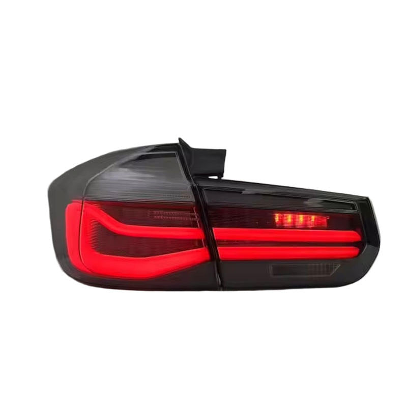 Vekto LED tail lights for BMW 3 Series F31 Touring 2013-2018, showing sleek design and bright illumination in a close-up shot.