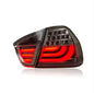 Vekto LED tail lights for BMW 3 Series E90 2005-2008, showing sleek taillight design with clear lenses and integrated turn signals.