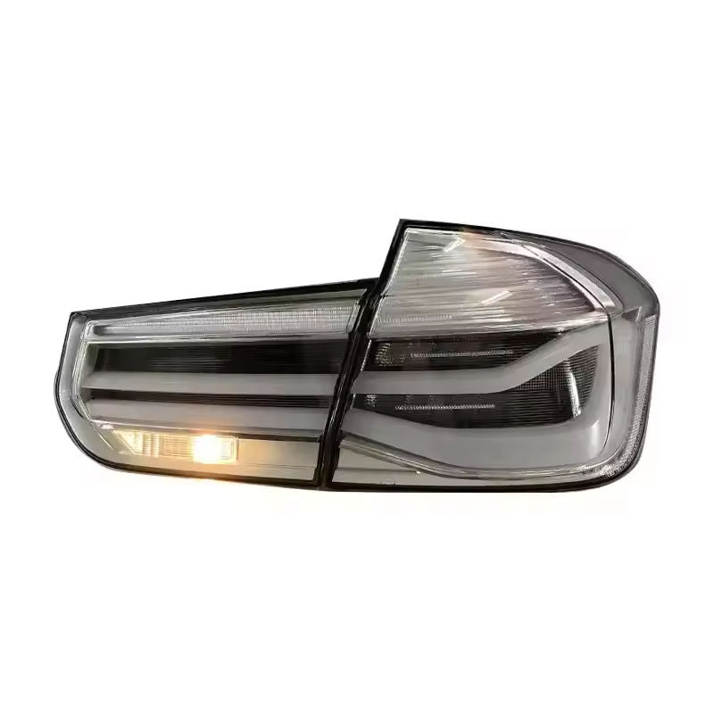 Vekto MP Style clear LED tail lights for BMW 3 Series F30/F35 2012-2018, showing sleek, modern taillight design on vehicle