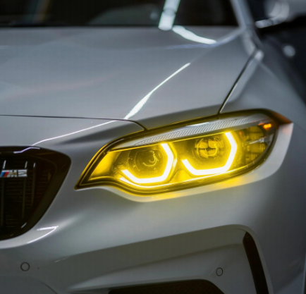 Vekto RGB LED DRL headlight modules for BMW F22/F23 2 Series and F87 M2 LCI 2018-2020, showcasing vibrant lighting features