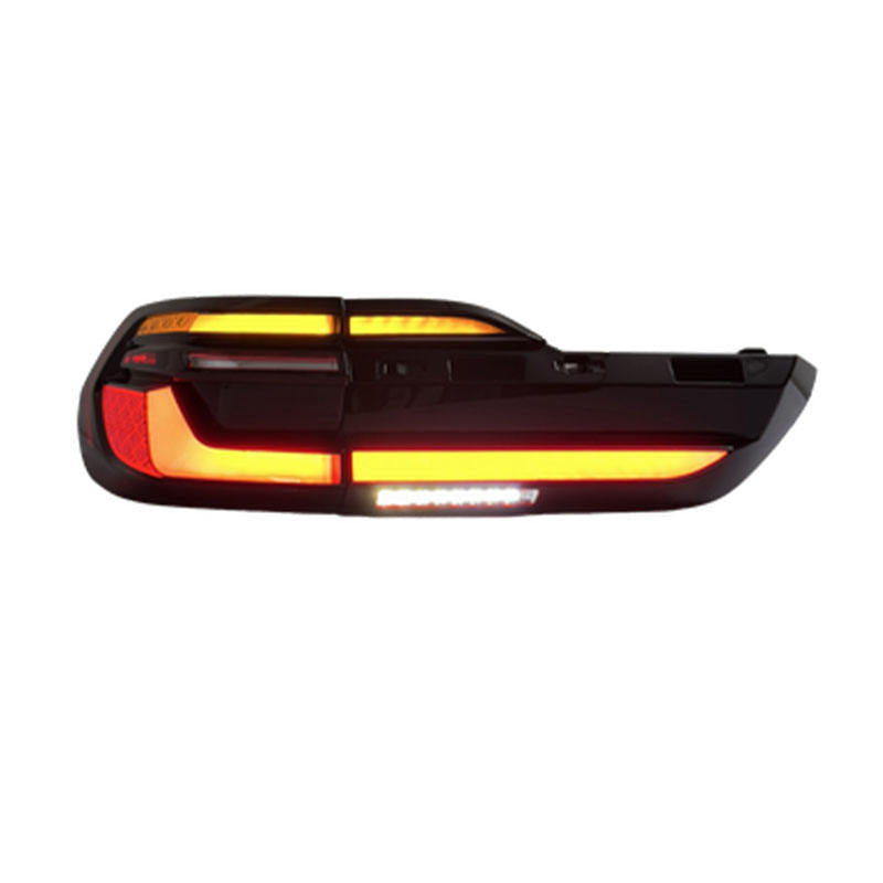 BMW X7 G07 LED tail light assembly with dynamic turn signals by Vekto, 2019-2023, showing sleek red and clear lens design.