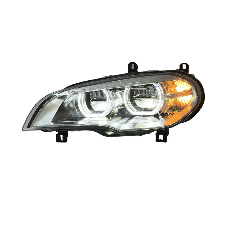 Vekto LED headlights for BMW X5 E70 2008-2013, close-up of the sleek headlight design with bright LED elements.