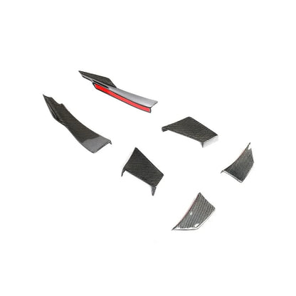 Carbon fiber front bumper canards for BMW F80 M3 and F82 F83 M4, designed for improved aerodynamics and sporty appearance.