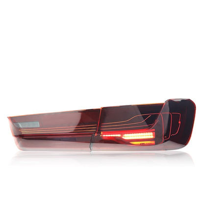 Vekto CSL style LED tail lights for BMW G20 3 Series and G28 2019-2024, showing sleek, illuminated rear lights on a black BMW.