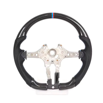 Vekto carbon fiber steering wheel for BMW F30 F10 F15 M3 M5 X Series, close-up view showing textured carbon fiber surface.