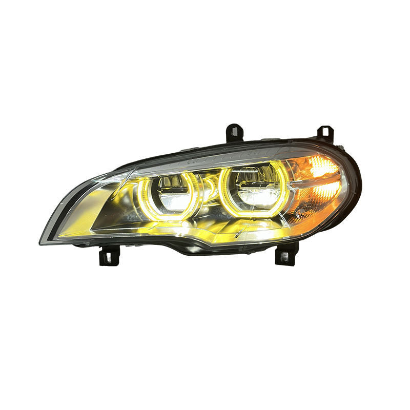 Vekto LED headlights for BMW X5 E70 2008-2013, close-up of headlight assembly with bright LED bulbs installed.