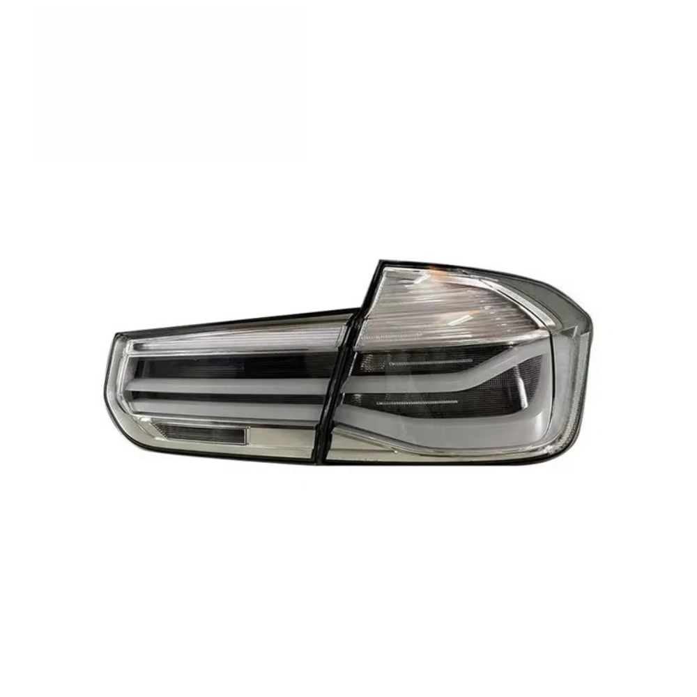Vekto clear LED tail lights for BMW F30 3 Series and M3, 2012-2017, showing sleek, modern tail light design on a vehicle.