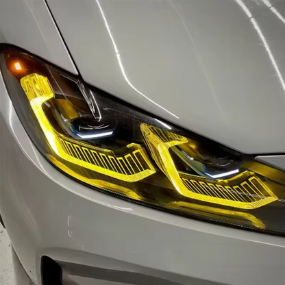 Vekto RGB LED DRL headlight module kit installed on BMW G80 M3, G82 M4, G22 4 Series, showing vibrant RGB lighting effects.