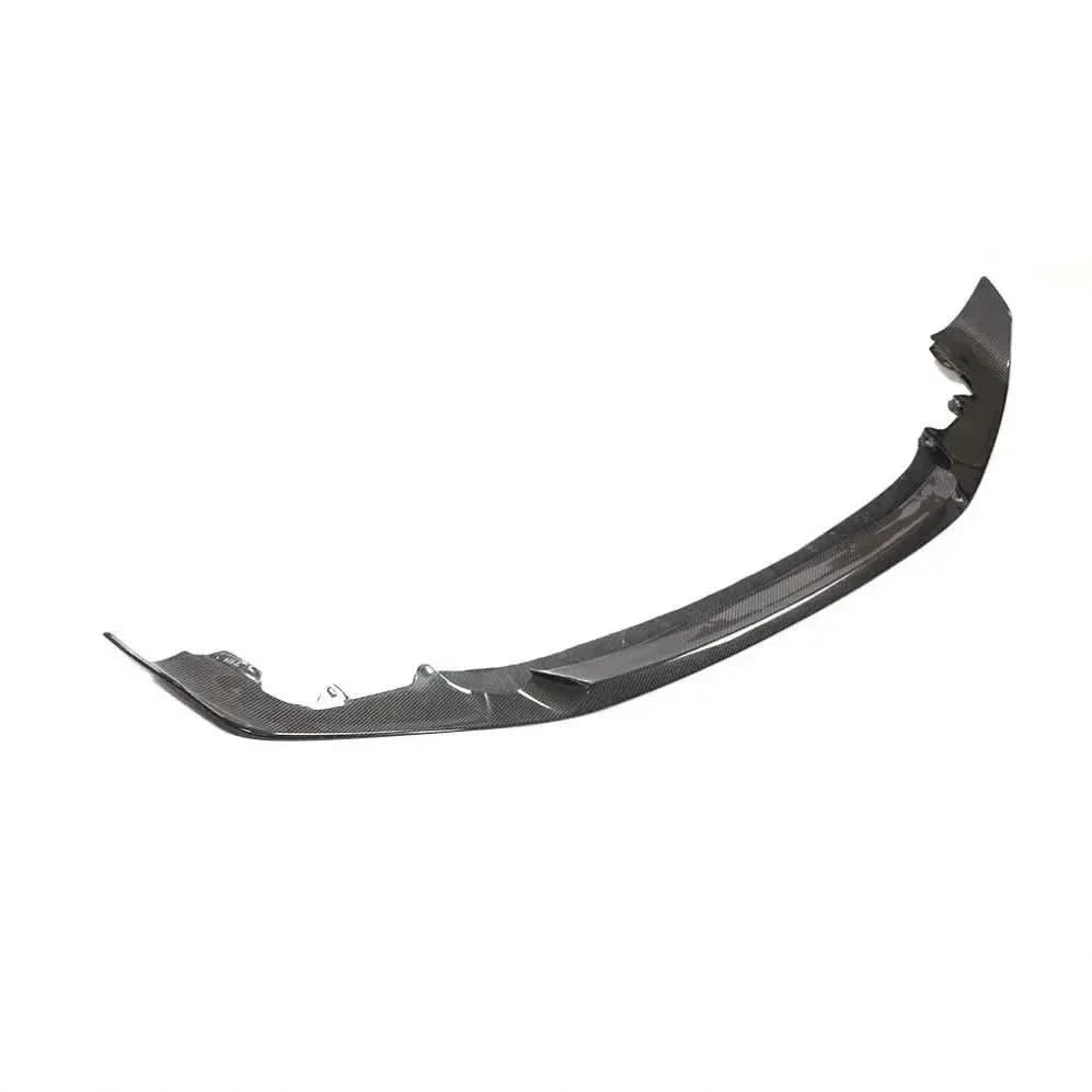 Gloss carbon fiber front bumper lip for BMW M2 Competition F87, lightweight and aerodynamic front splitter by K2 Industries.