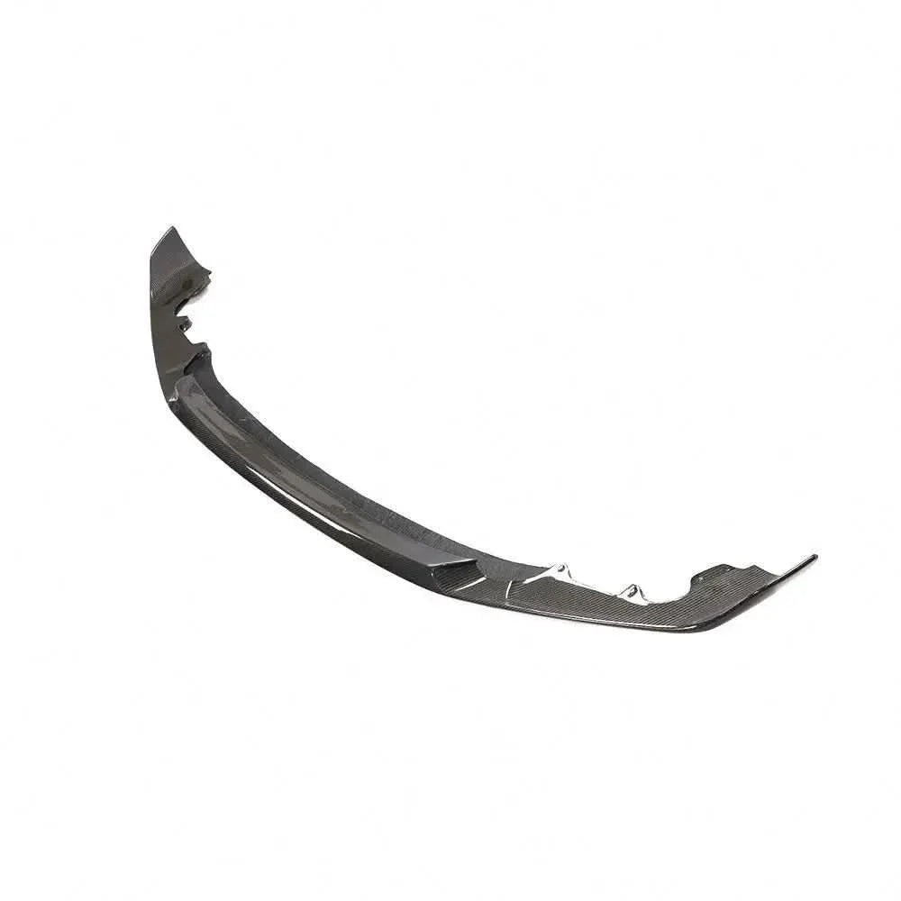 Gloss carbon fiber front bumper lip for BMW M2 Competition F87, K2 Industries carbon fiber front splitter on a black car.