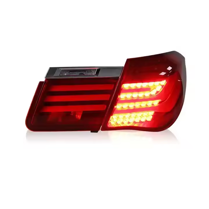 Vekto LED tail lights for BMW 7 Series F01/F02 2009-2015, showing illuminated red and clear lens sections on the rear of the vehicle.