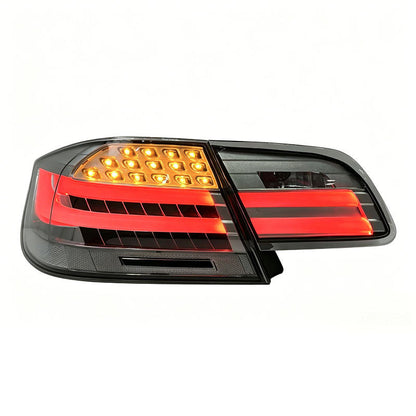 Vekto clear LED taillights for BMW 3 Series E92 coupe 2006-2012, showing sleek design and bright illumination in the image.