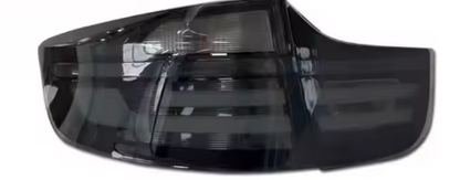 Vekto LED taillights for BMW X6 E71 E72 2007-2014, showing red and clear lens tail light assembly on a vehicle.