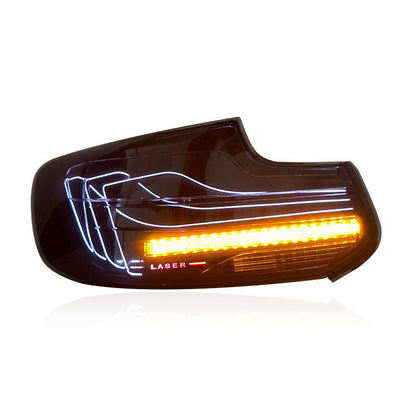 Vekto CSL RGB LED tail lights for BMW 2 Series F22 and F87 M2, front and rear view, illuminated during nighttime.