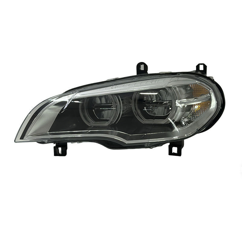 Vekto LED headlights for BMW X5 E70 2008-2013, showing illuminated front lights with clear lens and modern design.