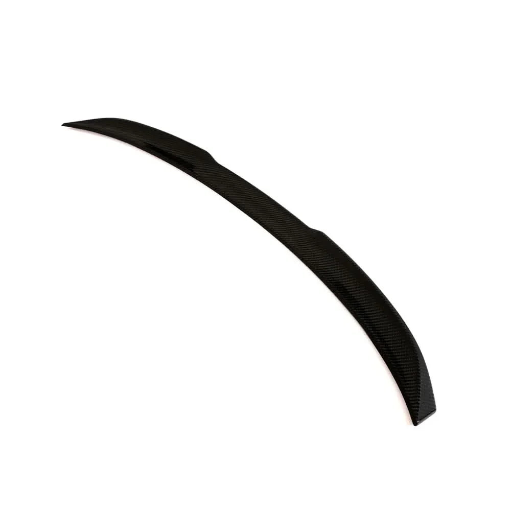 Dry carbon fiber M Style trunk spoiler for BMW G82/G83 M4 and G22 430i, showing sleek, aerodynamic design on a sports car.