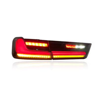 Vekto LED rear taillight assembly for BMW 3 Series G20 G28 and M3 G80, showing illuminated brake and signal lights.