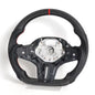 Vekto carbon fiber BMW G Series M Sport steering wheel with sleek black finish and ergonomic grip design.