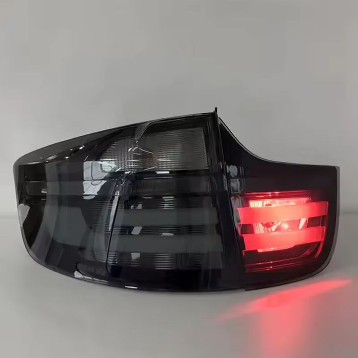Vekto LED taillights for BMW X6 E71 2007-2014, showing sleek red and clear tail light assemblies installed on the vehicle.