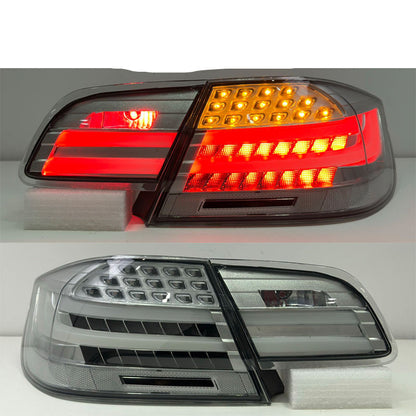 Clear LED taillights for BMW 3 Series E92 coupe, model years 2006-2012, by Vekto, showing sleek, modern tail light design.