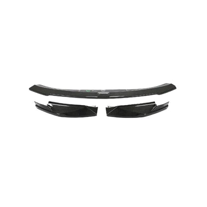 Dry carbon fiber front lip for BMW G80 M3 and G82 G83 M4, showing sleek design and glossy finish by K2 Industries.