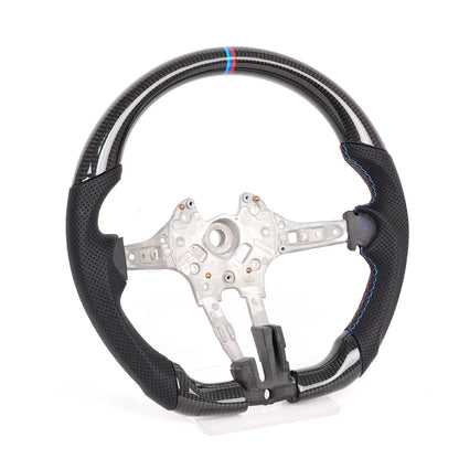 Vekto real carbon fiber steering wheel for BMW F-Series, M2, X1, X3, X6 with tri-color or red stripe accents, detailed close-up image.