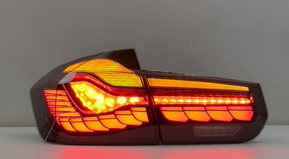 Vekto GTS Dragon Scale LED tail lights installed on BMW F30/F35/F80 2012-2019, showcasing sleek taillight design.