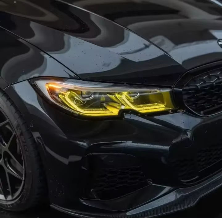 Yellow LED DRL modules with heatsinks for BMW G20 G21 G28 3 Series headlights, Vekto brand, 2020-2022.