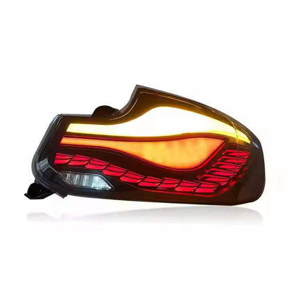 Vekto GTS Dragon Scale LED taillights on a BMW 2 Series F22/F23 and M2 F87, showcasing their distinctive dragon scale design.