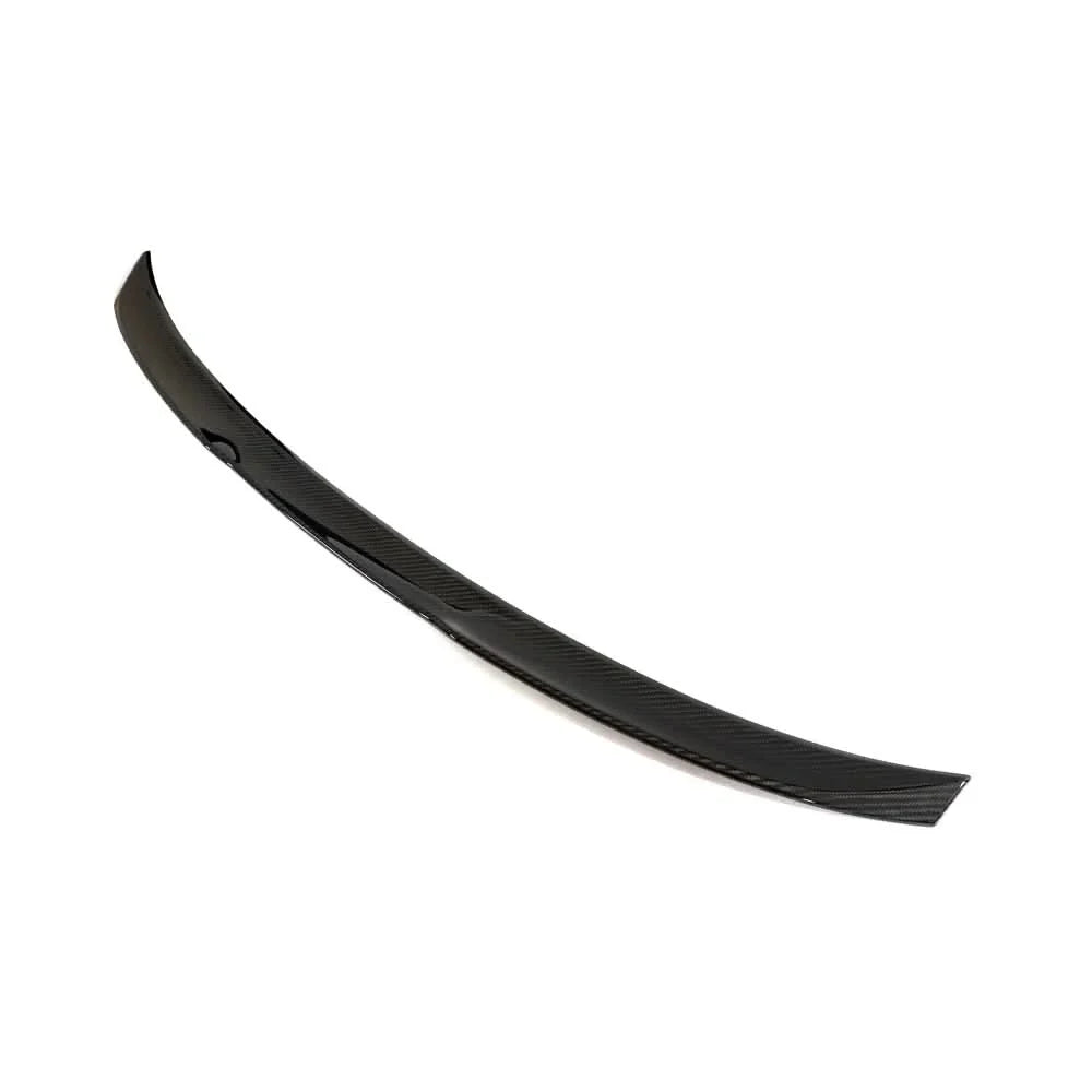 Dry carbon fiber M Style trunk spoiler for BMW G82/G83 M4 and G22 430i, made by K2 Industries, shown on the vehicle's rear.