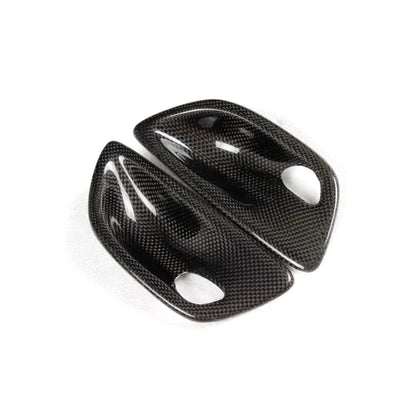 Carbon fiber interior door handle trim set for BMW F10 5 Series from K2 Industries, performance style door handle covers.