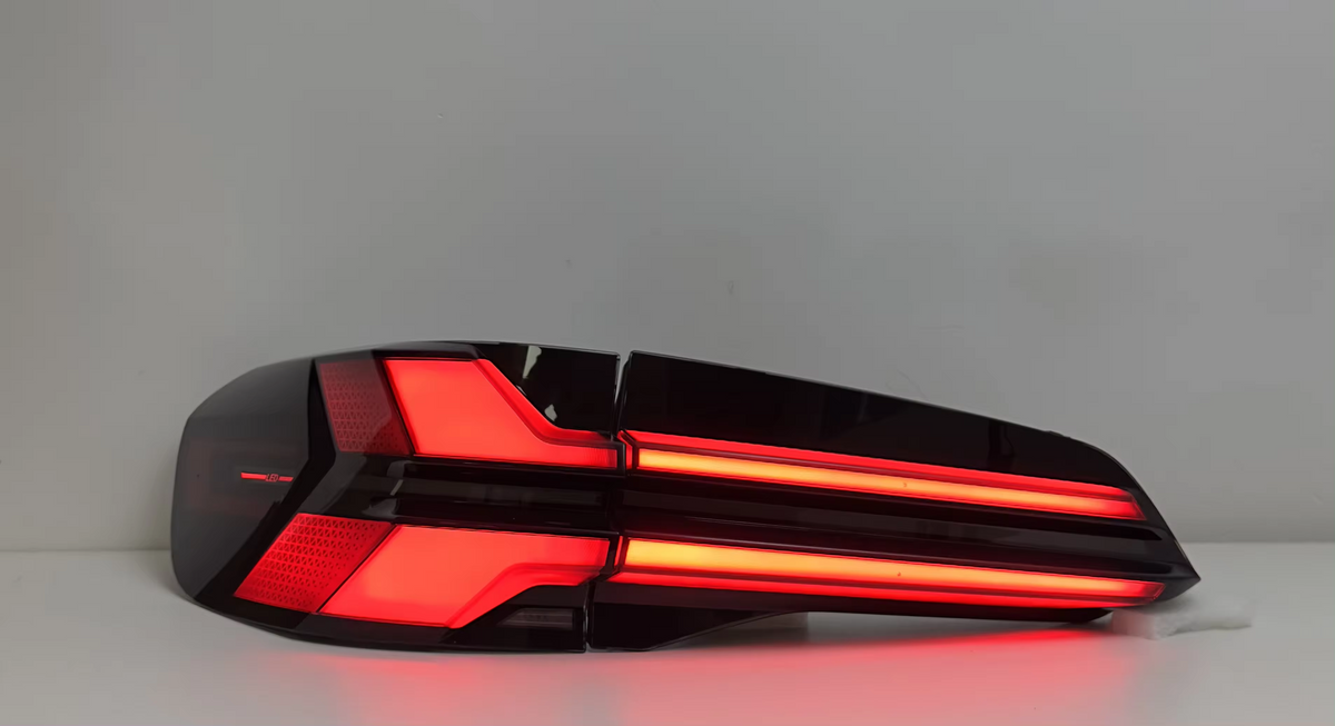 Vekto LED taillights for BMW X5 G05 2019-2023, showing sleek tail light design with illuminated red and clear lenses.