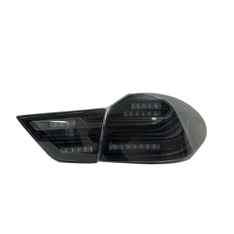 Vekto CSL style LED taillights for BMW X4 F26 2013-2016, showcasing sleek red and clear lens design with modern lighting elements.