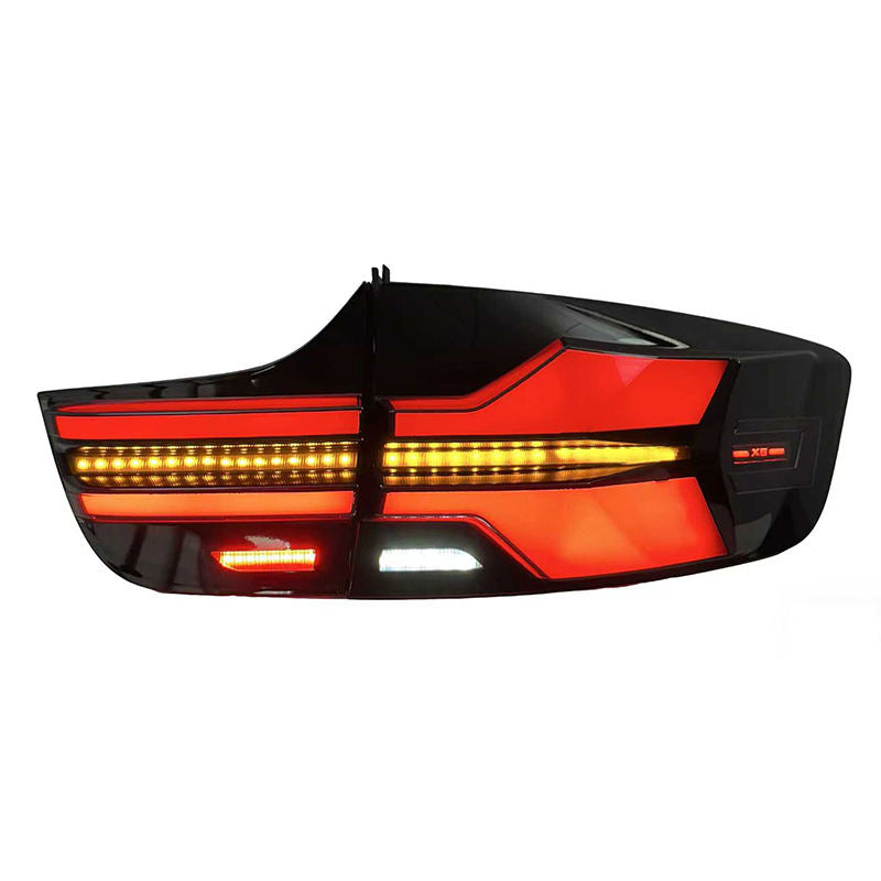 Vekto BMW X6 E71 G05 style LED tail lights installed on a 2008-2014 BMW X6 vehicle, showcasing sleek red and clear lens design.