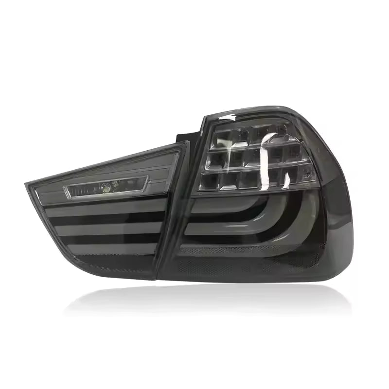 Vekto LED tail lights for BMW 3 Series E90 LCI 2009-2012, showing sleek red and clear lens design for rear lighting.