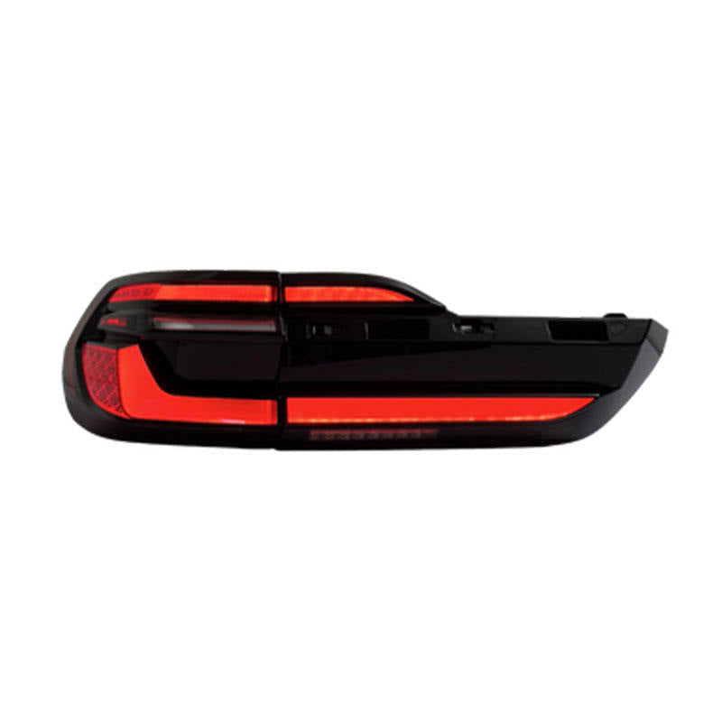 BMW X7 G07 LED tail light assembly with dynamic turn signal by Vekto, showing sleek red and clear lens design.