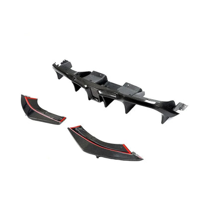 Gloss carbon fiber rear diffuser for BMW M2 F87 and M2 Competition, showcasing sleek aerodynamic design and textured finish.