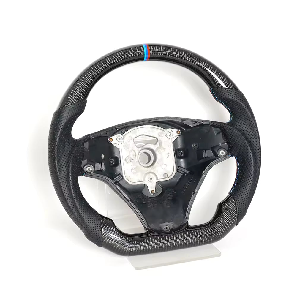 Vekto real carbon fiber steering wheel for BMW E90 E92 E93 M3, 328i, 335i, and 135i models, 2009-2013, close-up view