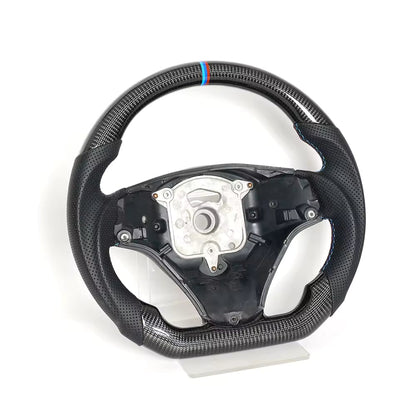 Vekto real carbon fiber steering wheel for BMW E90 E92 E93 M3, 328i, 335i, and 135i models, 2009-2013, close-up view